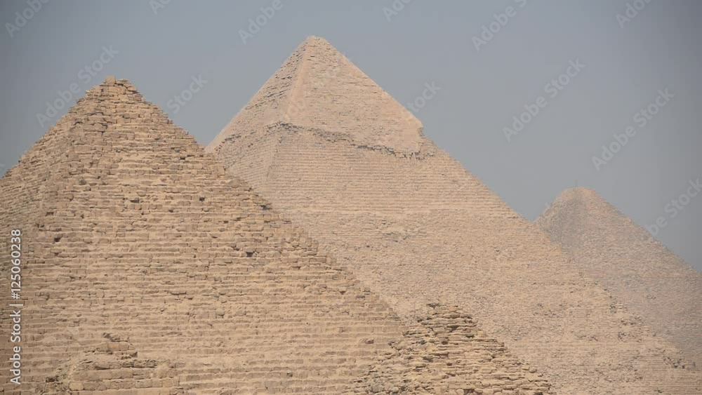 Zoom Out - The Great Pyramids at Giza- Daytime - Giza Egypt Zoom Out - The Great Pyramids at Giza- Daytime - Giza Egypt