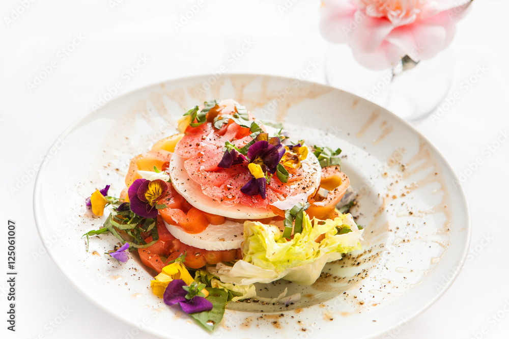 heirloom tomato salad with johnny jump up flowerrs
