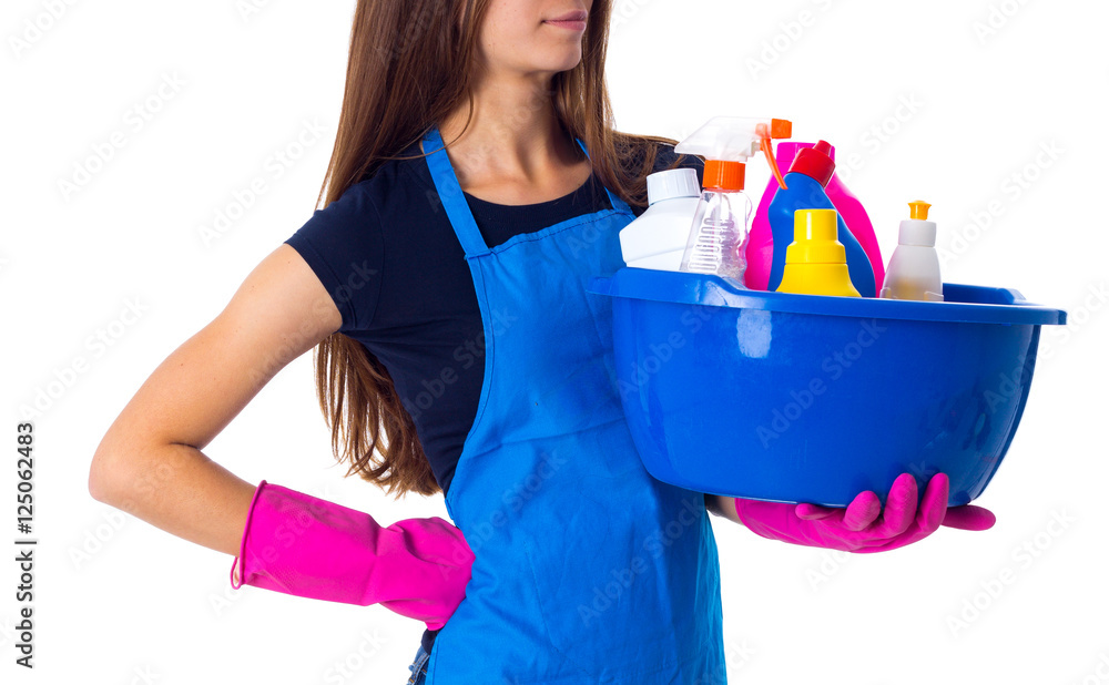 Woman holding cleaning things in washbowl Woman holding cleaning things in washbowl