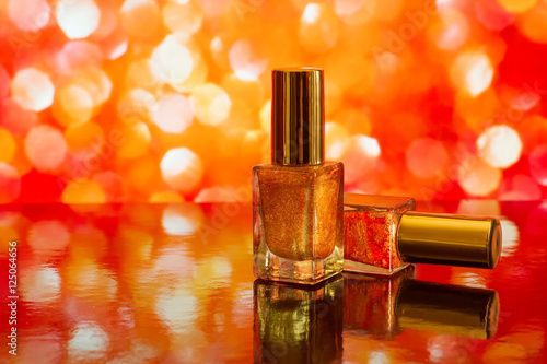 Two nail polish bottles on ...