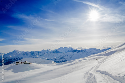Winter snow covered mountain peaks in Europe. The Alps winter mo