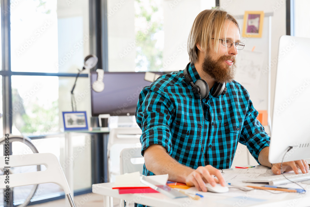 Young man working in office Young man working in office