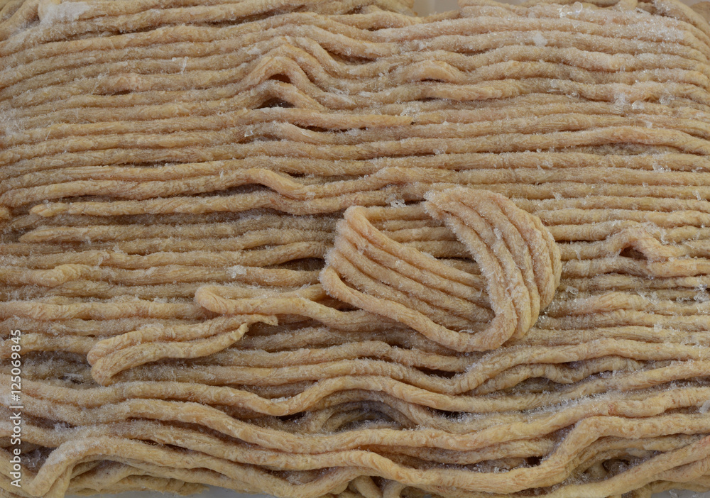 Close up of frozen ground white turkey meat Close up of frozen ground white turkey meat