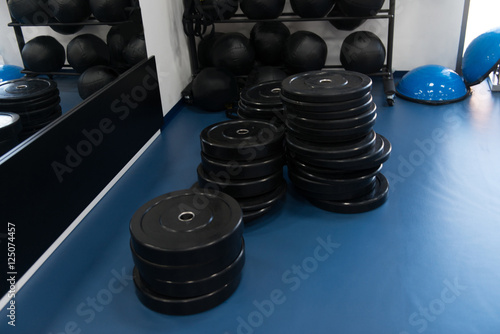 Weights On Floor In The Gym