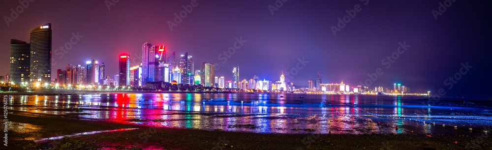 Fototapeta premium Qingdao skyline at night seen from Beach N3, Shandong, China