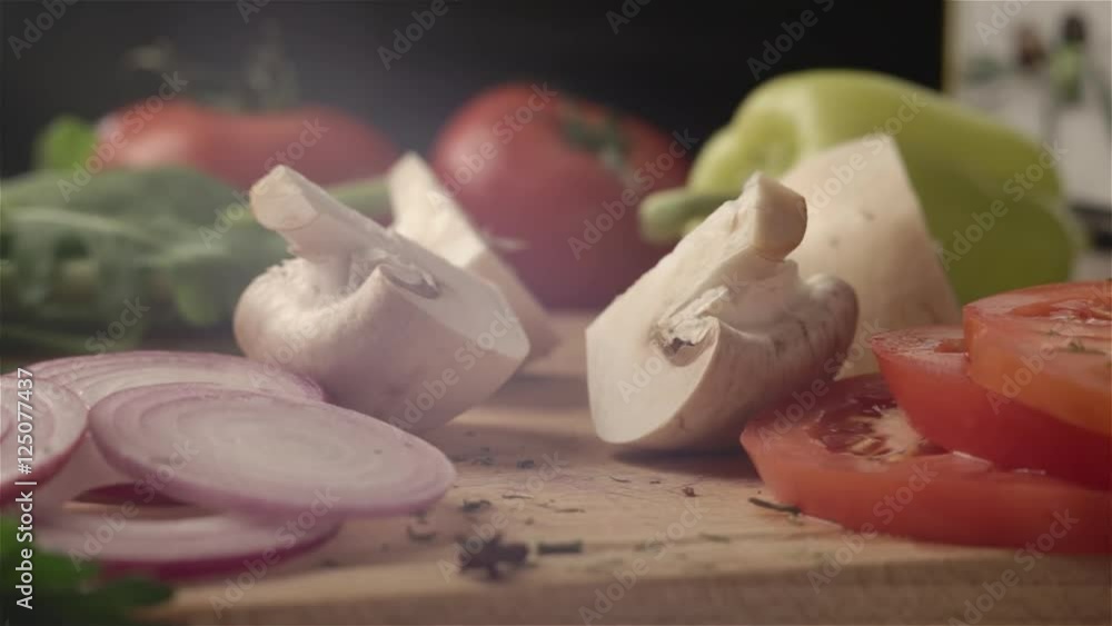 Female hands cut champignon mushroom Female hands cut champignon mushroom