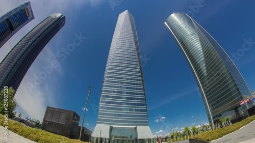 skyscrapers timelapse hyperlapse in the Four Towers Business Area with the tallest skyscrapers in Madrid and Spain  photo