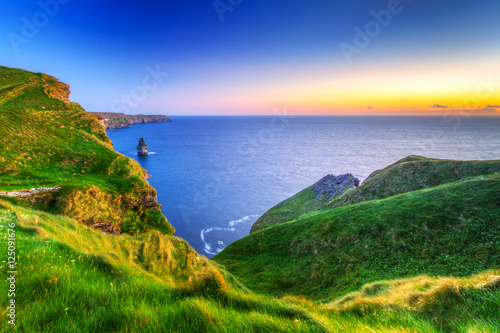 Cliffs of Moher at sunset in Co. Clare, Ireland photo