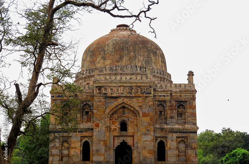 Sample of ancient indian architecture of the XV century - the tomb of one of the Mughal rulers of Delhi in Lodi Garden. India.