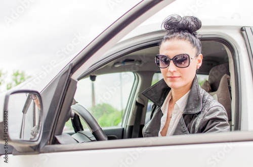 Woman sitting in the car