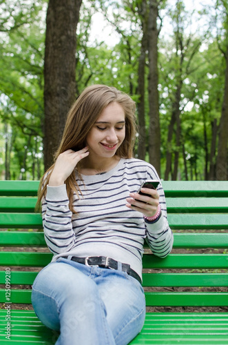 Young woman using her phone