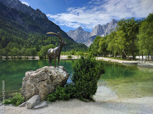 Obraz na płótnie Lake Jasna and mountain goat statue in Kranjska Gora, Slovenia