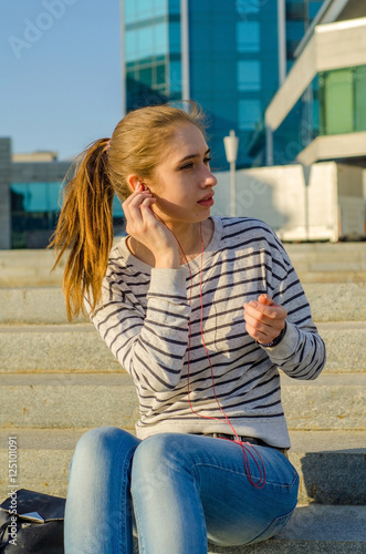 Young woman listening to music