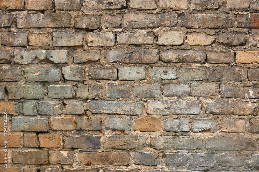 Old painted brick wall background texture