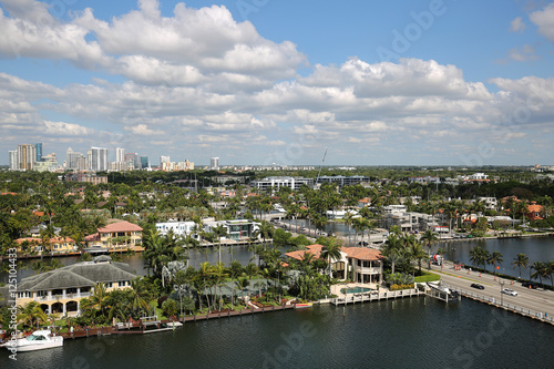 Fort Lauderdale skyline and upscale residential homes along Las Olas Boulevard