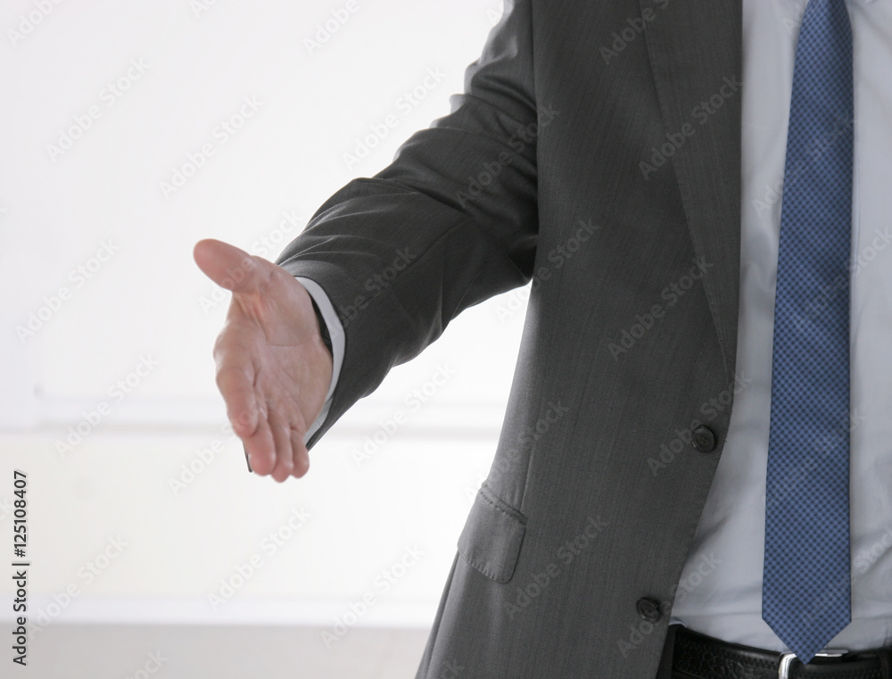 Fototapeta premium Handshake of two businesman isolated on white
