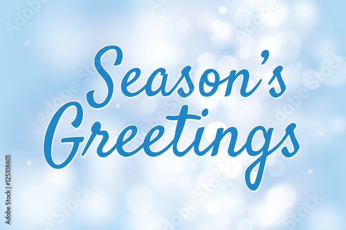 Season's greetings with blue bokeh background for christmas them