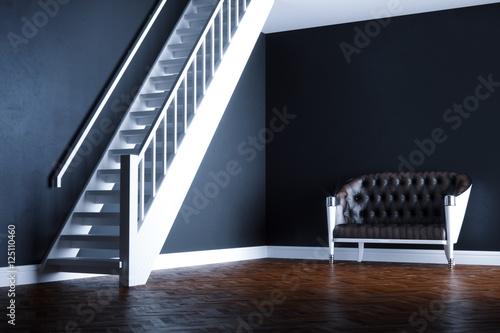 Vintage leather sofa in new black interior on wooden parquet