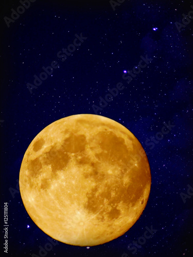 Full yellow moon with star at dark night sky background