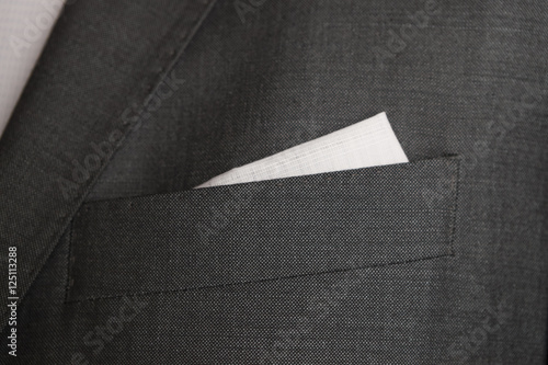 taylored menswear jacket. Detail with with pocket and handkerchi