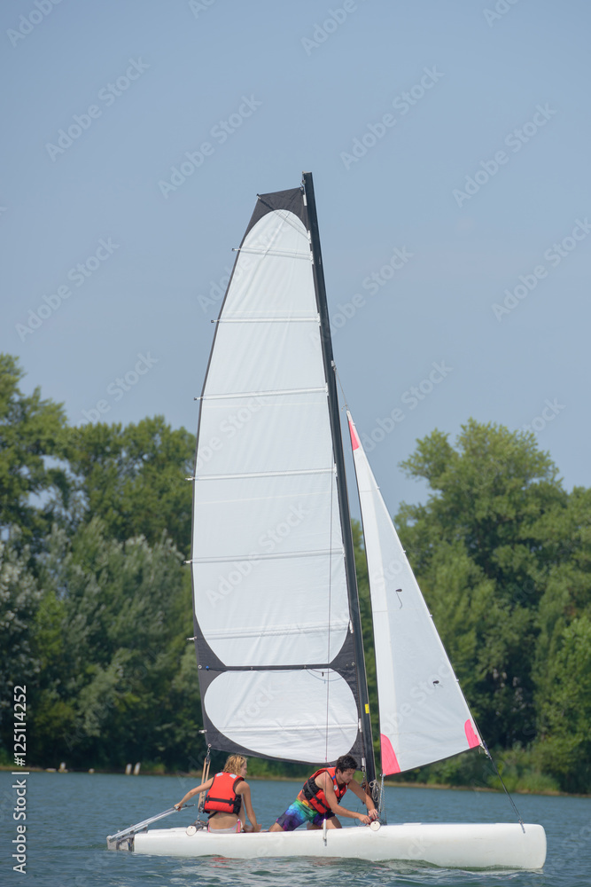 Fototapeta premium adjusting the sails