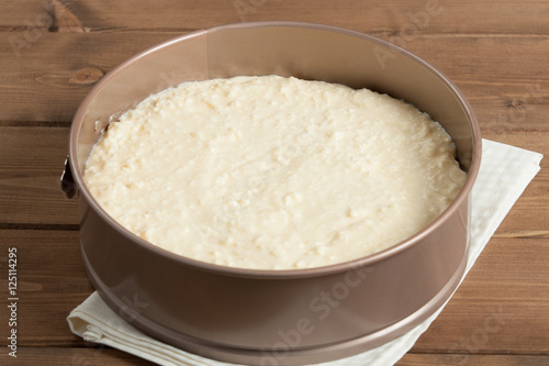Cooking Process Of Homebaked Cottage Cheese Pie. Raw Dough In Tr