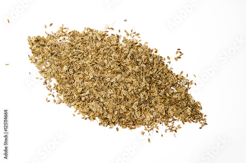 Pile of dill seeds isolated on white background