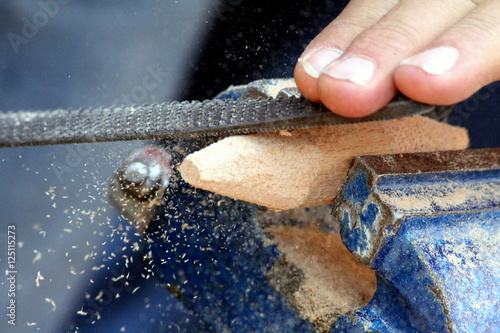 Fotografía Crafting of a wooden toy for an ancient italian street game