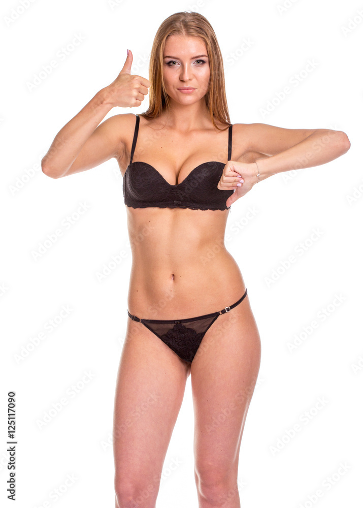 Young sexy woman in black undies gesturing OK Young sexy woman in black undies gesturing OK