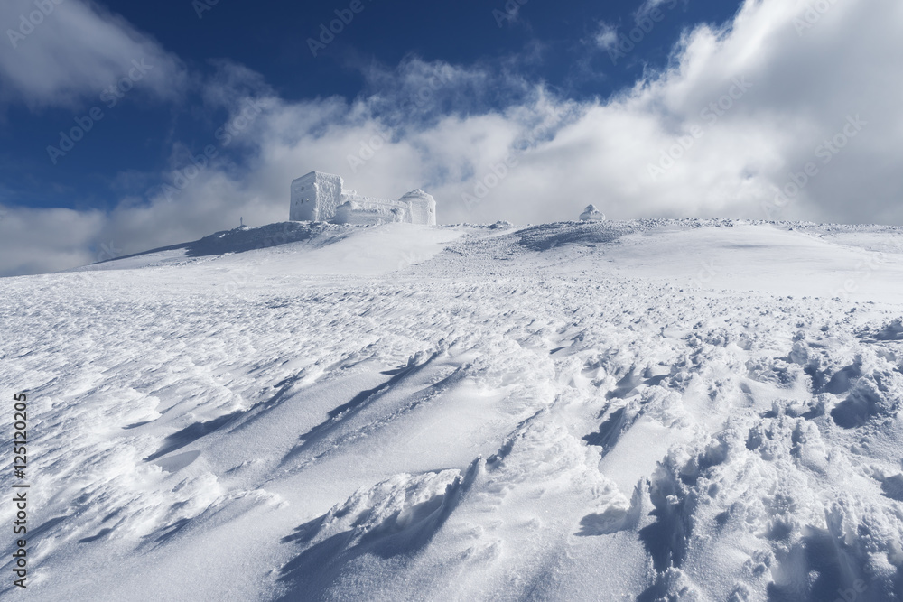 Winter landscape with the observatory in the mountains