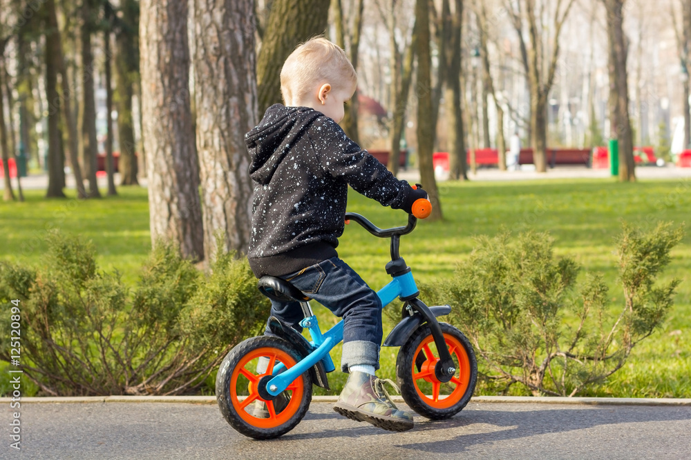 Little boy on the run bike Little boy on the run bike