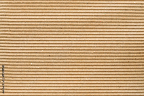 Brown corrugated cardboard useful as a background photo