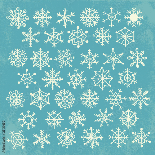 Vector set of simple hand drawn snowflakes. Vintage style. 