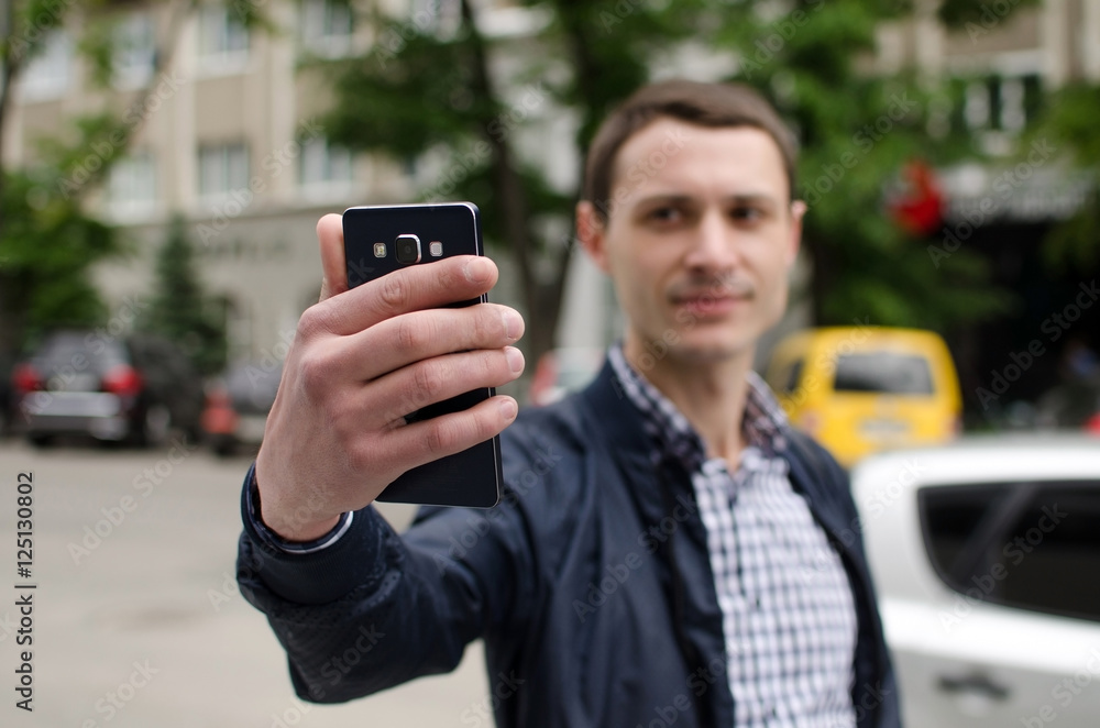 Young man making selfie Young man making selfie