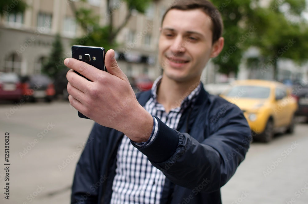 Young man making selfie Young man making selfie