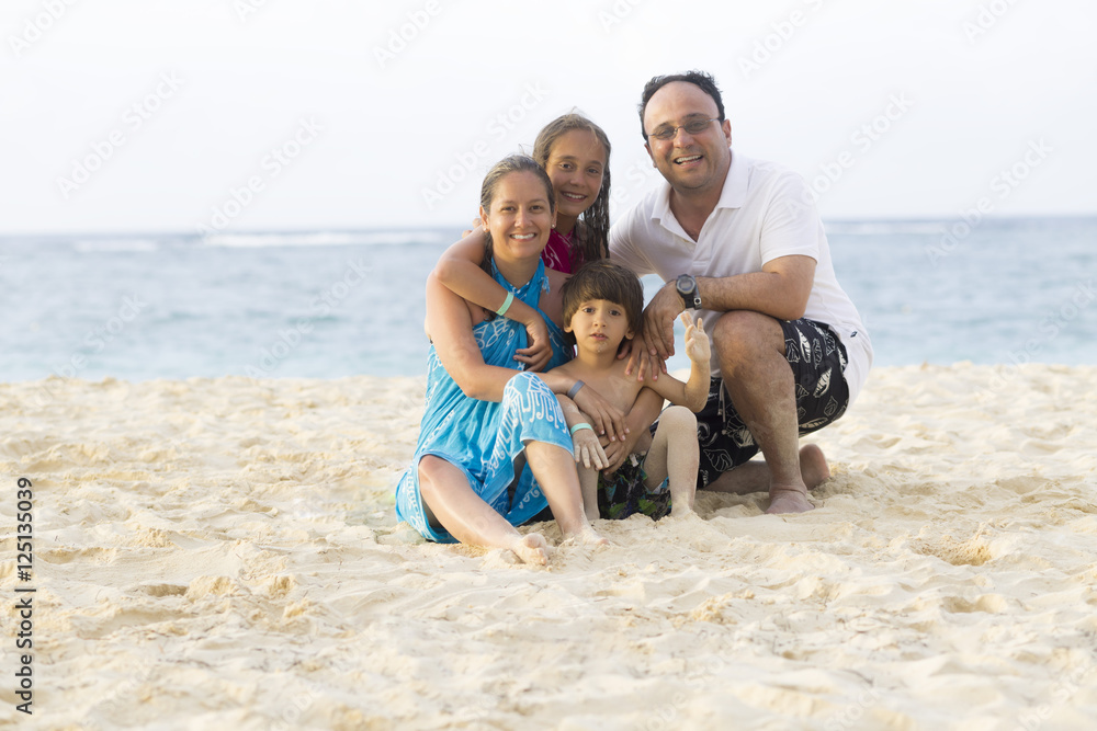 Lovely Family Enjoying at the beach Lovely Family Enjoying at the beach