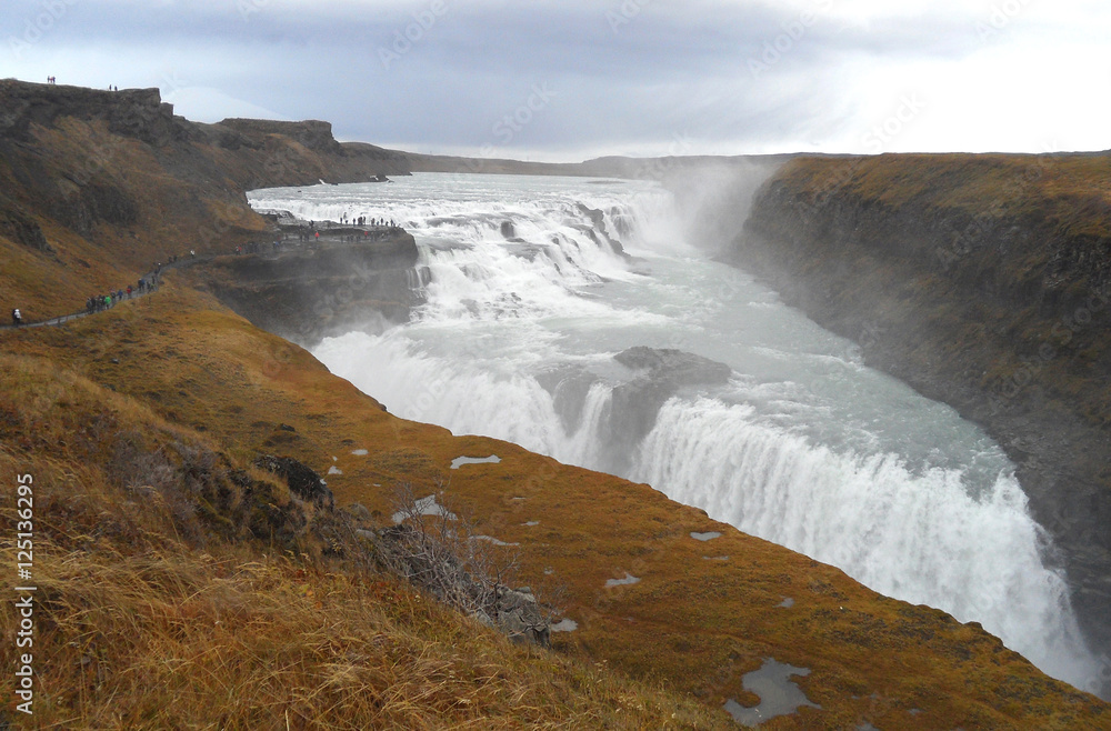 Breathtaking Gullfos Waterfall under Cloudy Sky of Late Autumn, the Golden Circle, Iceland Breathtaking Gullfos Waterfall under Cloudy Sky of Late Autumn, the Golden Circle, Iceland