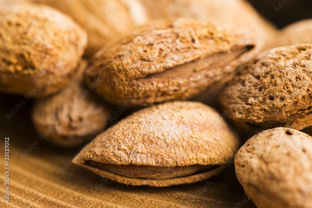 Heap of almond nuts in shell Heap of almond nuts in shell