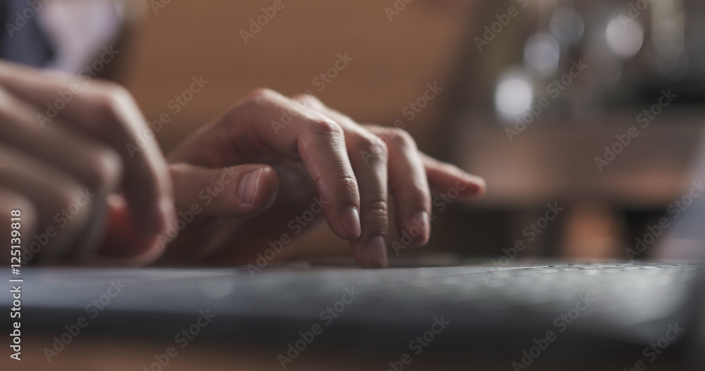young man working on notebook in cafe or home hands closeup