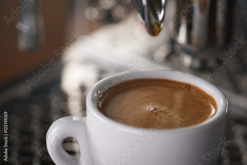 closeup photo of prepared espresso coffee from coffee machine