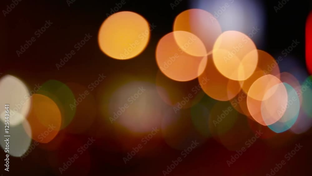 Christmas street illumination. Defocused city lights. Blurred night traffic lights Christmas street illumination. Defocused city lights. Blurred night traffic lights