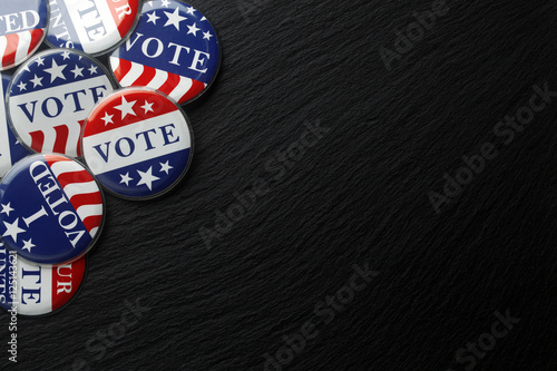 Red, white, and blue vote buttons background photo