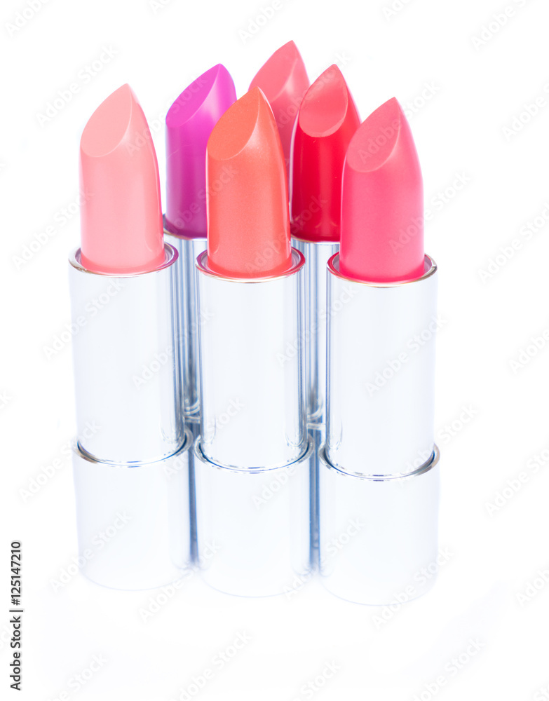puple, pink and red shiny lipsticks group isolated on white background puple, pink and red shiny lipsticks group isolated on white background