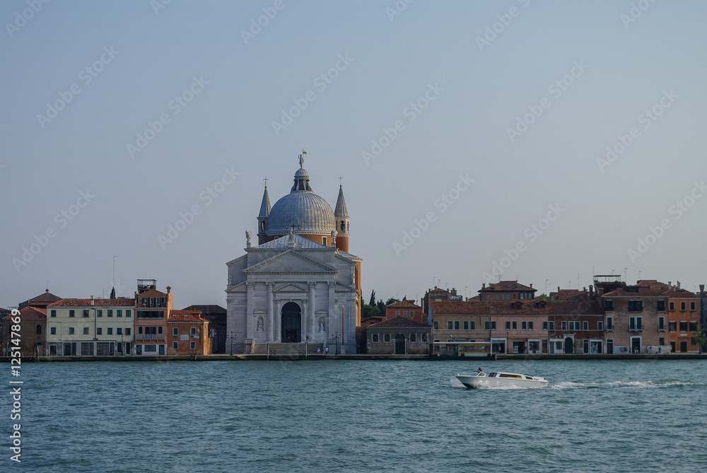 View on La Giudecca island with basilica del Redentore on the sunset in Venice. Italy