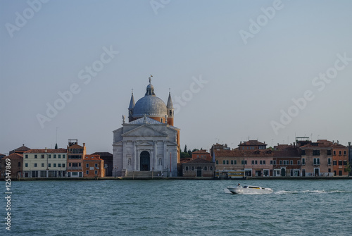 View on La Giudecca island with basilica del Redentore on the sunset in Venice. Italy