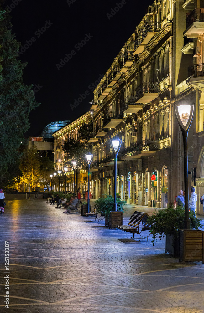 Obraz premium Nizami Street with bright night illumination. Shopping center of Baku.