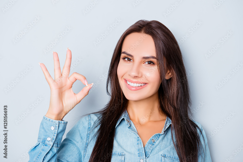 Portrait of cheerful happy brunette woman gesturing Portrait of cheerful happy brunette woman gesturing