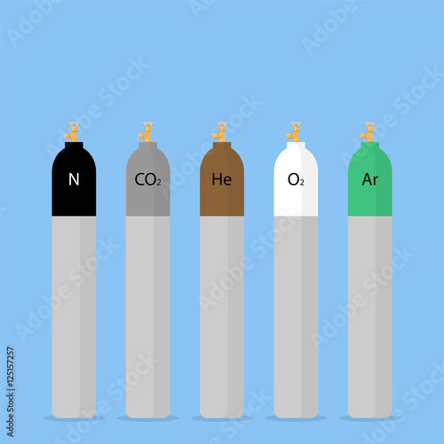 Gas cylinders in different colors. Cylinders for compressed tech