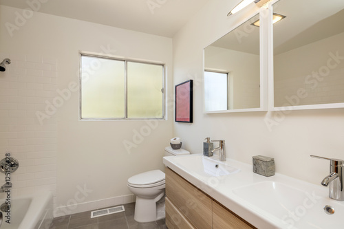 Beige Bathroom with large mirrors  interior and modern bathroom.