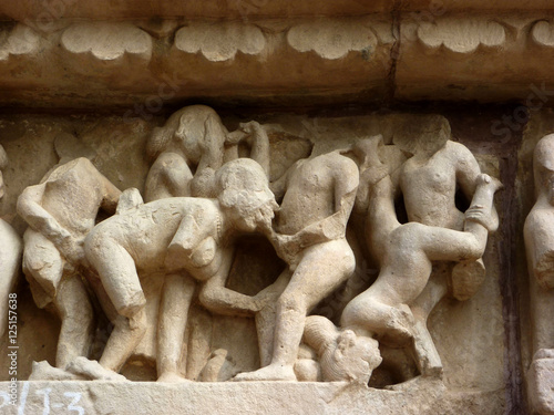 Sculptures of loving couples, illustrating the Kama Sutra